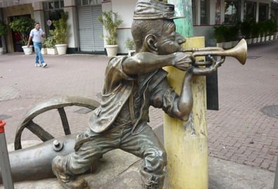 Escultura trompetista