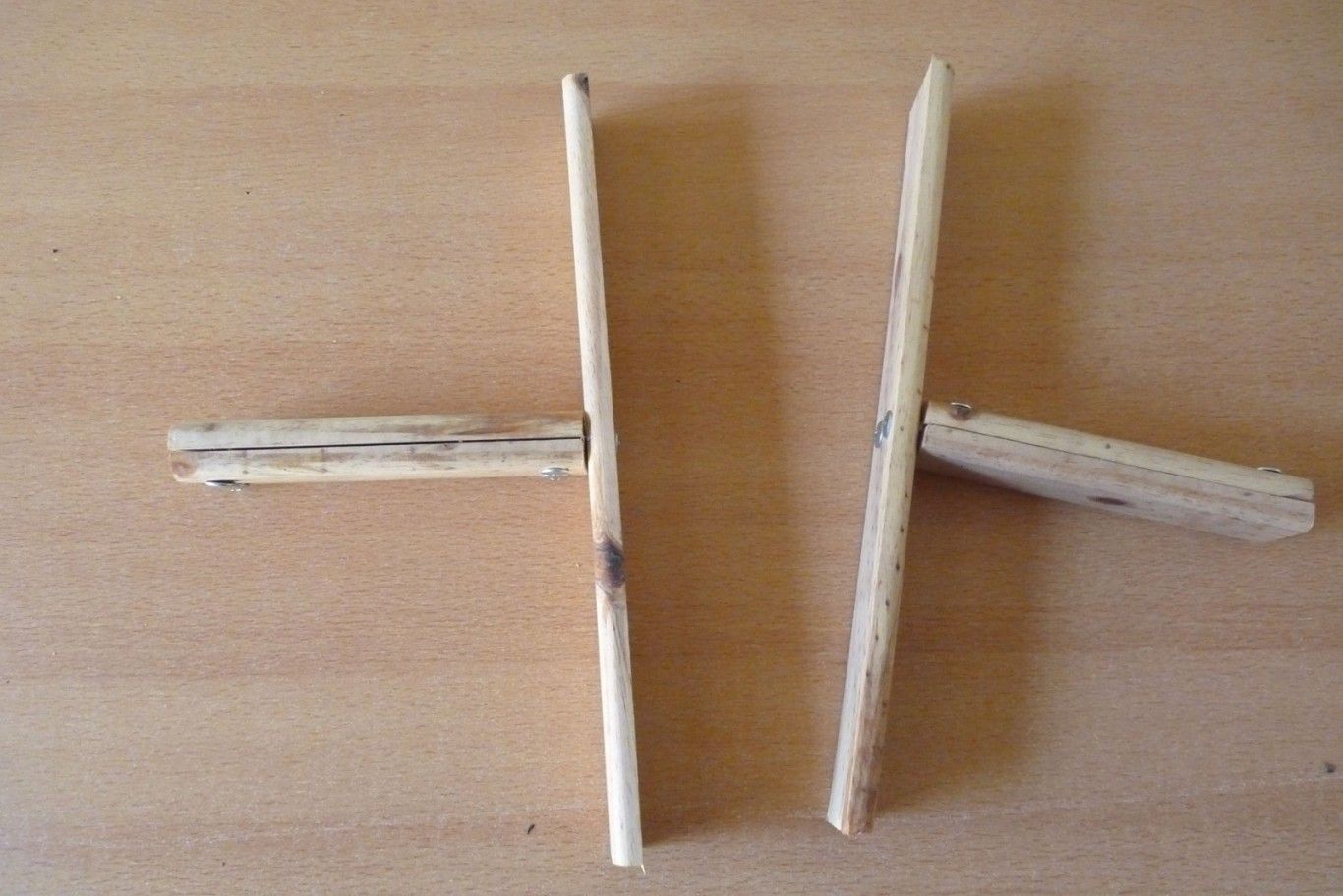 Cruz desarmada-vertical