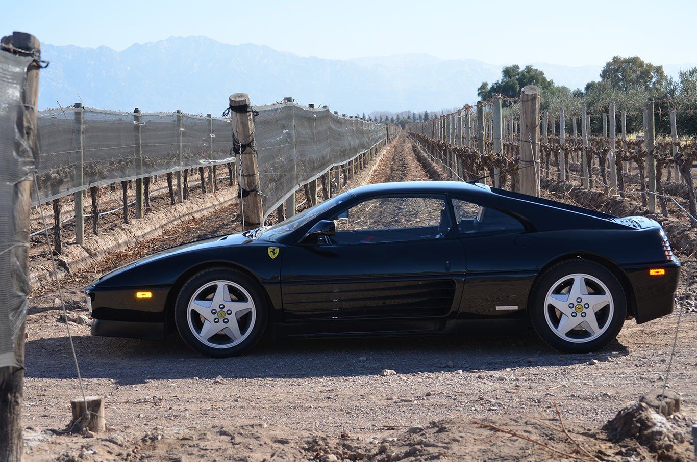 Porsche salida-julio-ferrari-negra