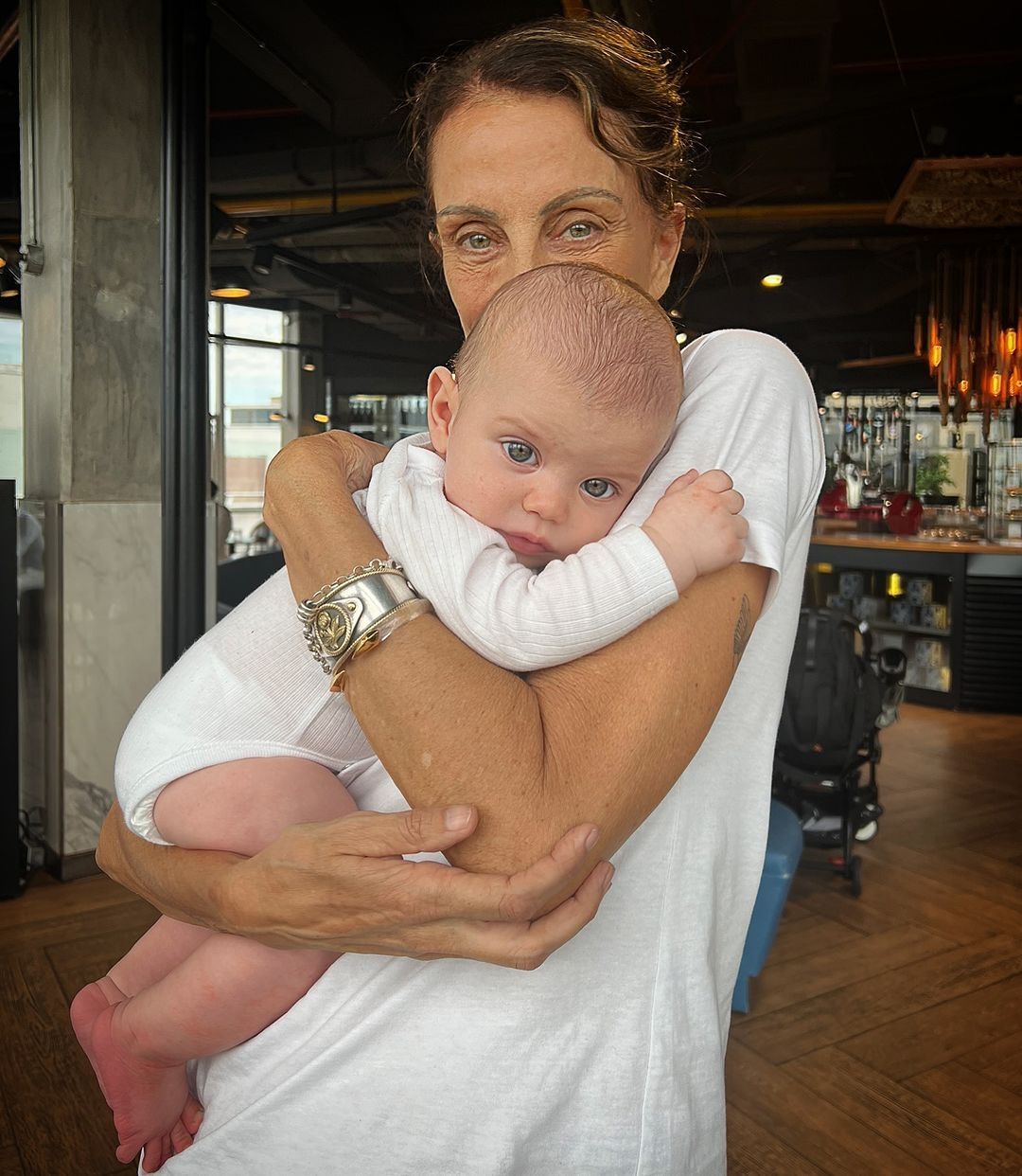 Nequi Galotti y su nieto. 