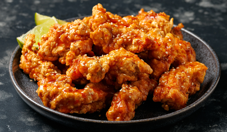 Esta receta de pollo frito coreano se popularizó en Corea después de la década de 1970. Esta receta de pollo frito coreano se popularizó en Corea después de la década de 1970.