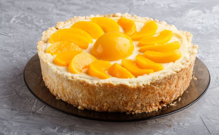 Tarta de durazno y crema Una receta deliciosa para hacer en pocos pasos. Foto: Shutterstock