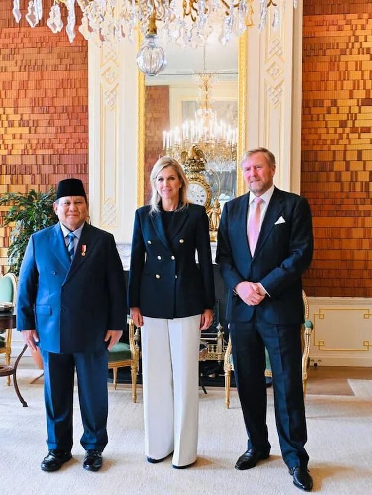 El look sastrero de Máxima. El look sastrero de Máxima.