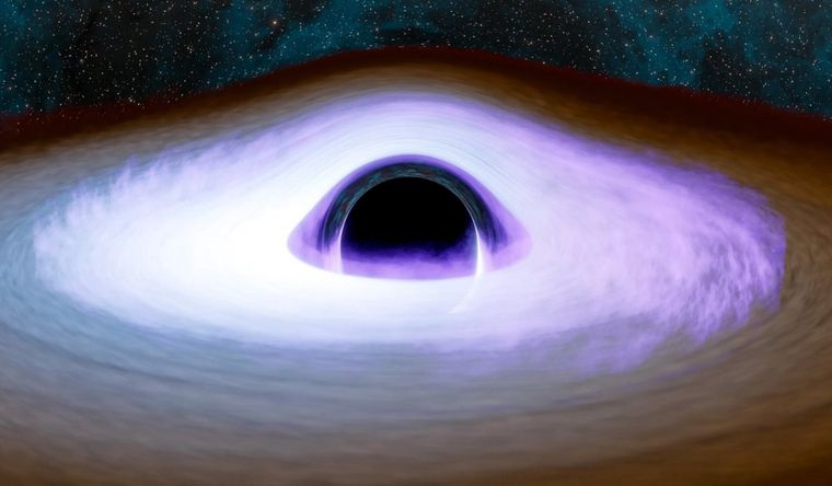 Esta ilustración de material girando alrededor de un agujero negro resalta una característica particular, llamada “corona”, que brilla intensamente en la luz de rayos X. Foto Dpa Esta ilustración de material girando alrededor de un agujero negro resalta una característica particular, llamada “corona”, que brilla intensamente en la luz de rayos X. Foto Dpa