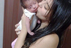 Solange Díaz y la beba.