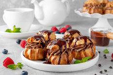Postre sofisticado: cómo preparar profiteroles con crema de chocolate Foto: Shutterstock