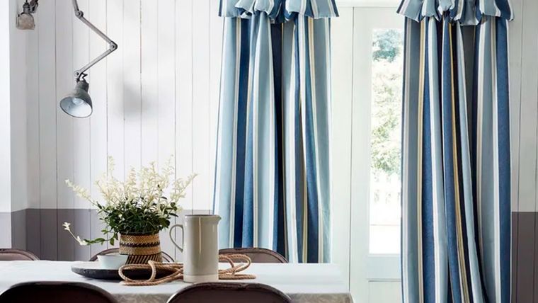 Una tendencia actual es el uso de cortinas con telas grandes, que en sí constituyen un verdadero punto focal. Foto: Villa Nova - Home & Gardens