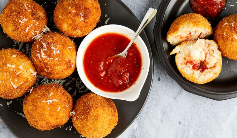 Arancini de casa: un festín de sabores sicilianos Foto: Delish