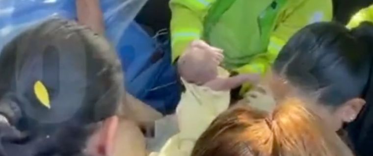 PORTADA bebe en la calle