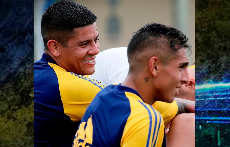 Marcos Rojo y Agustín Almendra.