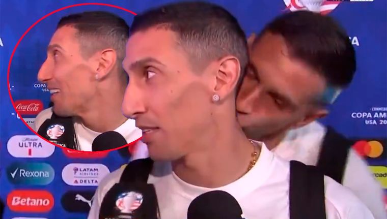 Di María fue sorprendido por un beso de Dibu Martínez en la nuca mientras le daba una nota a TyC Sports. Foto: captura TyC Sports