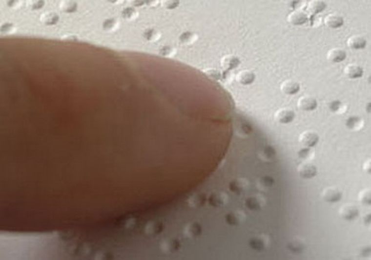 Libros educativos en sistema braille.