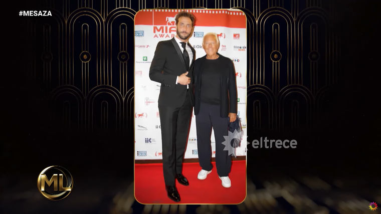 Luciano Cáceres junto a Giorgio Armani. Foto: captura de video YouTube/ El Trece. Luciano Cáceres junto a Giorgio Armani. Foto: captura de video YouTube/ El Trece. 