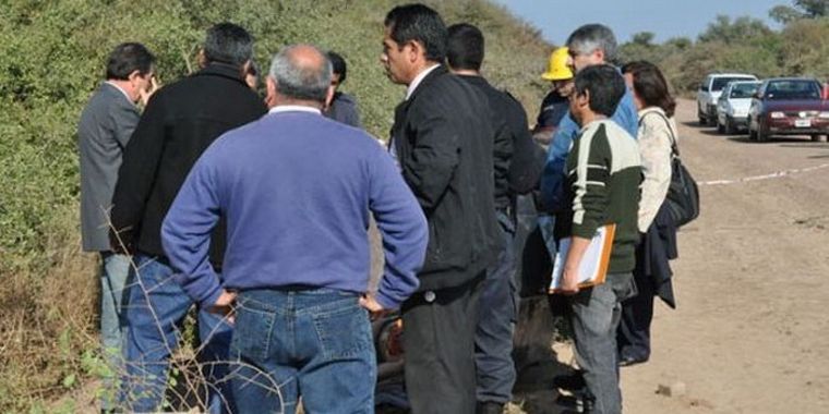 Autoridades en el sitio donde fueron halladas las partes humanas. Foto: nuevodiarioweb.com