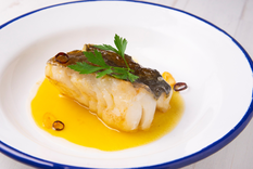 El nombre de la receta proviene del sonido que hace el aceite al emulsionarse suavemente.