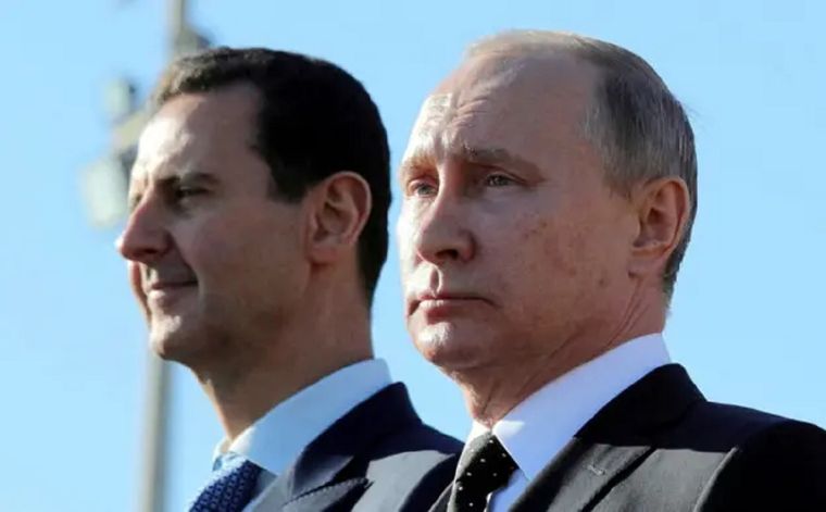El derrocado presidente de Siria junto a Vladimir Putin. Foto: Reuters