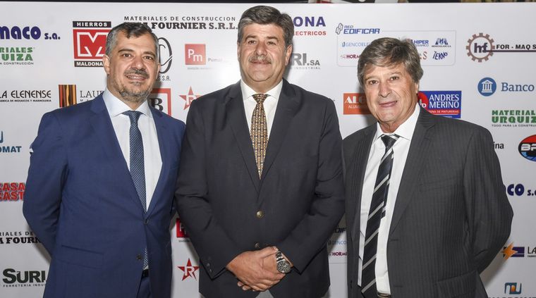 Gerardo Fernández -presidente de CECIM-, el vicegobernador Mario Abed y Atilio Calzetta.