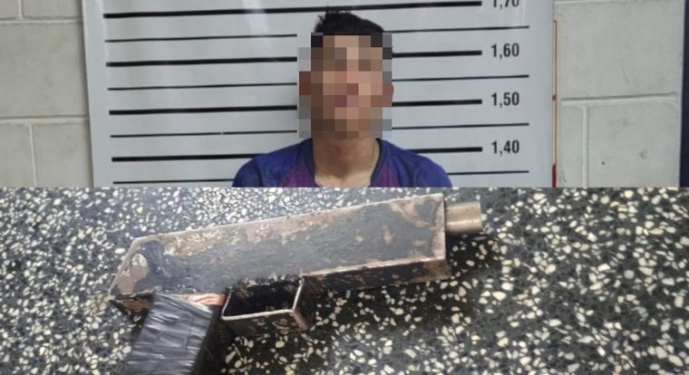 El detenido con el arma rudimentaria que uso.