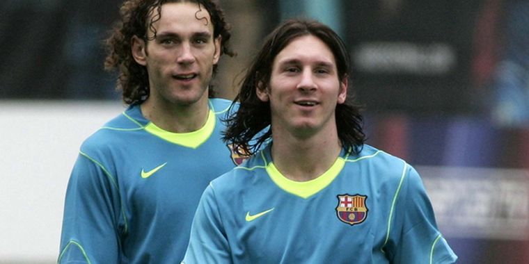 Lio Messi en un entrenamiento junto a Gabi Milito. Foto: AFP / Archivo