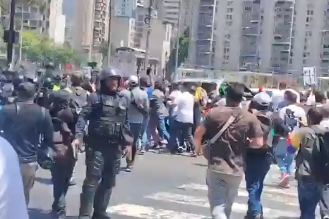 tension en venezuela: la policia freno con gases una marcha hacia el palacio de miraflores tension en venezuela: la policia freno con gases una marcha hacia el palacio de miraflores