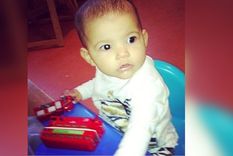 bebe es diagnosticada a traves de una foto familiar