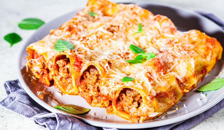 Canelones de carne y salsa de tomate al estilo italiano Foto: Shutterstock