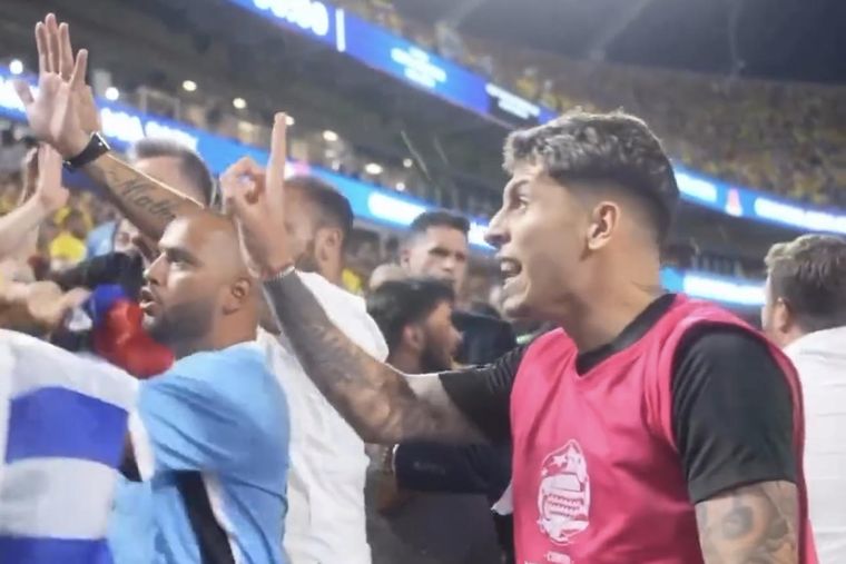 Mathías Olivera hace un gesto para evitar que la violencia siga. Foto: Captura Video