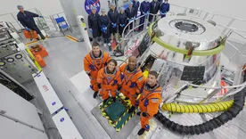 Los astronautas Reid Wiseman, Victor Glover y Christina Koch de la NASA, y el astronauta de la CSA (Agencia Espacial Canadiense) Jeremy Hansen pronto seleccionarán uno de los diseños finalistas. Los astronautas Reid Wiseman, Victor Glover y Christina Koch de la NASA, y el astronauta de la CSA (Agencia Espacial Canadiense) Jeremy Hansen pronto seleccionarán uno de los diseños finalistas.