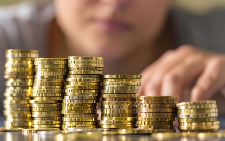 Estas citas te pueden ayudar a atraer la riqueza. Foto: Imagen generada por Midjourney