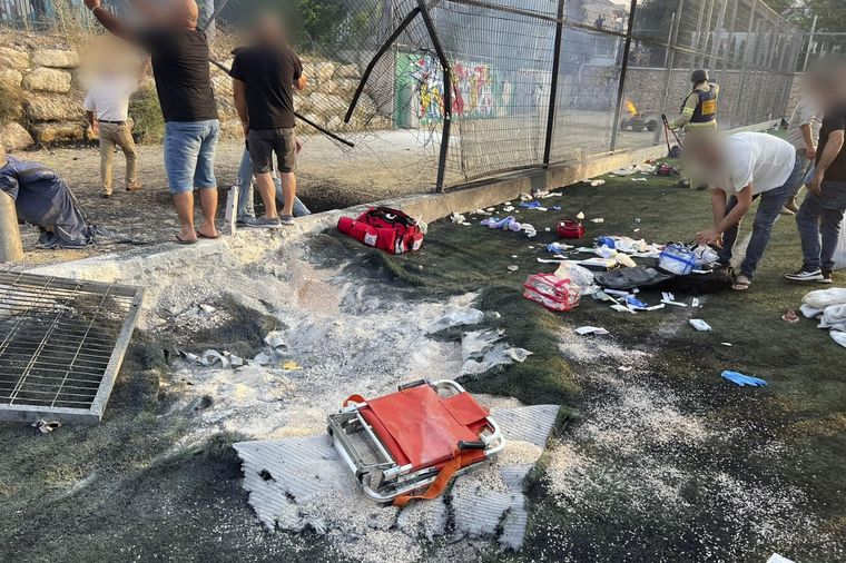 La cancha de fútbol donde fueron asesinados 12 niños Foto: EFE