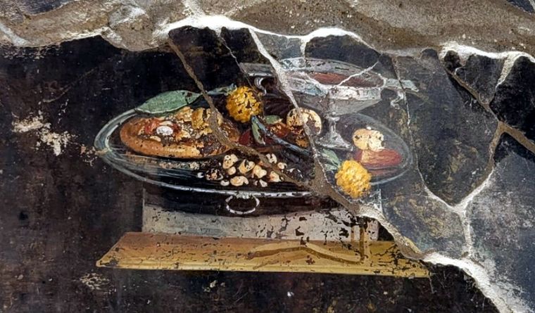 Pompeya fresco pizza El fresco claramente muestra este antecedente secular de la pizza italiana. Foto: Efe.