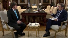 El presidente Javier Milei y el periodista Andrés Oppenheimer.