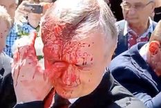 Sergei Andreyev, manchado con pintura roja. Foto: NewsFlorida.