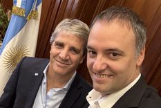 Manuel Adorni y Luis Caputo.