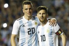 Giovani Lo Celso y Lionel Messi