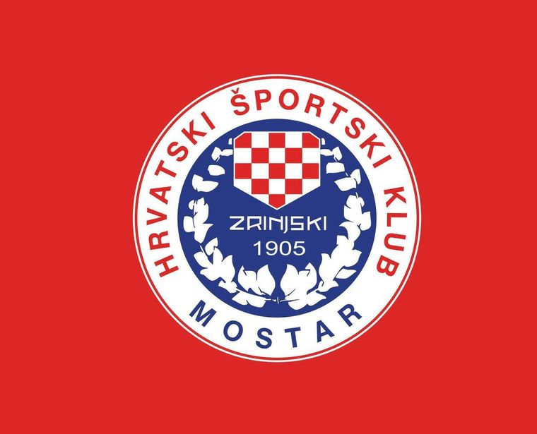 Escudo del Zrinjski. Posee un tablero rojo y blanco (šahovnica), símbolo del nacionalismo croata. Escudo del Zrinjski. Posee un tablero rojo y blanco (šahovnica), símbolo del nacionalismo croata.