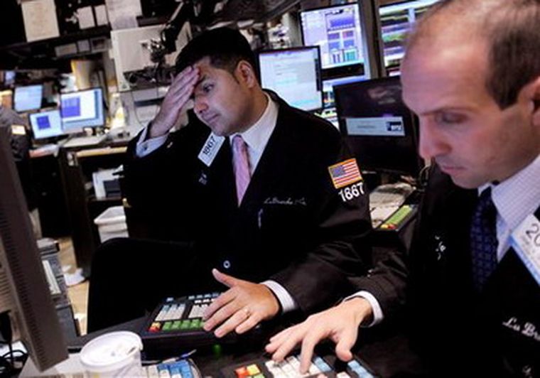 Operadores de Wall Street, en el inicio de una jornada negra. Foto: EFE