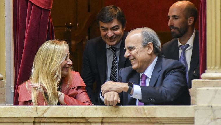 De Marchi junto a Karina Milei y Guilllermo Francos. Foto: NA