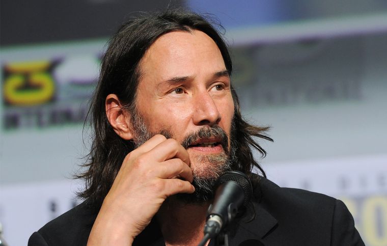 Foto: https://www.nme.com/news/film/keanu-reeves-makes-surprise-appearance-at-northamptonshire-couples-wedding-3299622