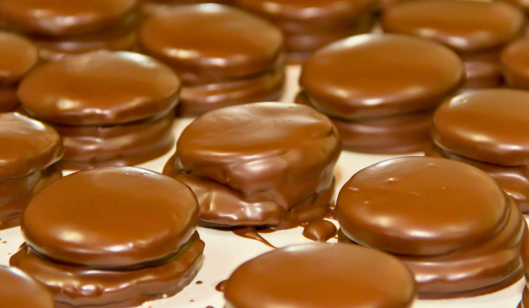 Receta de alfajores de pistacho cubiertos de chocolate Receta de alfajores de pistacho cubiertos de chocolate