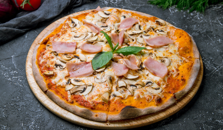 Pizza con jamón y champiñones: la combinación perfecta Foto: Shutterstock