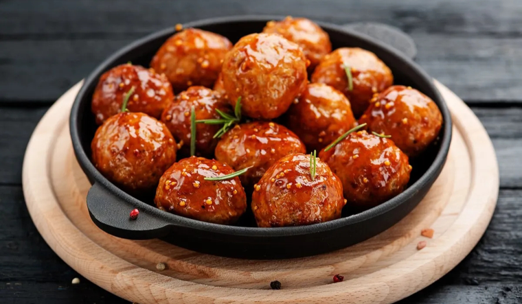 Albóndigas jugosas en salsa de tomate: ¡un clásico irresistible! Foto: Shutterstock