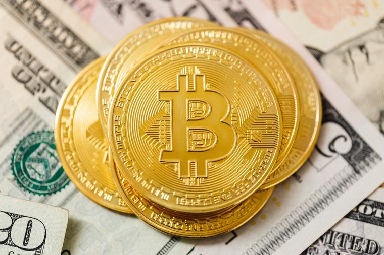 La principal criptomoneda orilló los 62 mil dólares de cotización. Foto: Getty Images