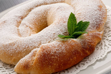 Ensaimada rellena casera: la receta dulce que conquista a todos Ensaimada rellena casera: la receta dulce que conquista a todos