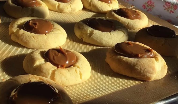 Probá esta receta de pepas con dulce de leche crocantes y dulces.
