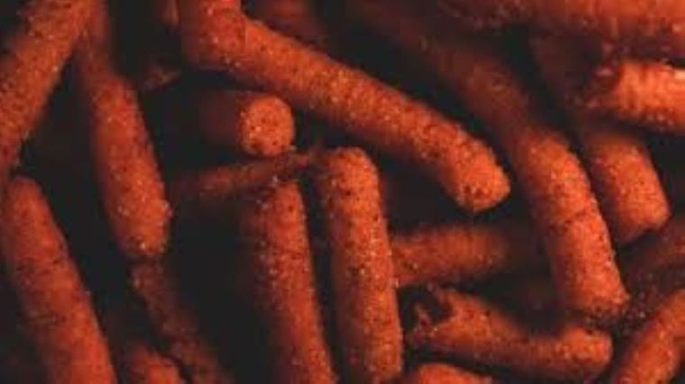 En simples pasos podrás preparar estos deliciosos snacks picantes de maíz Foto: Shutterstock