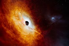 Reproducción artística que muestra el núcleo brillante de una galaxia distante alimentado por un agujero negro supermasivo. Foto: Efe.
