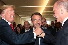 Macron, al centro, con Trump y Erdogan.