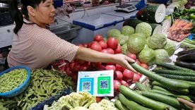 Los códigos QR para el pago a través de las súper aplicaciones Alipay y WeChat son algo común en los mercados chinos. Foto: GETTY IMAGES