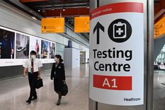 bloomberg y los riesgos economicos para 2022: omicron, crisis y subas de precios